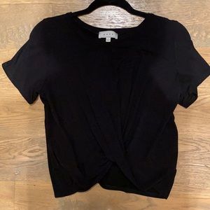 Black top with twist on bottom front!
